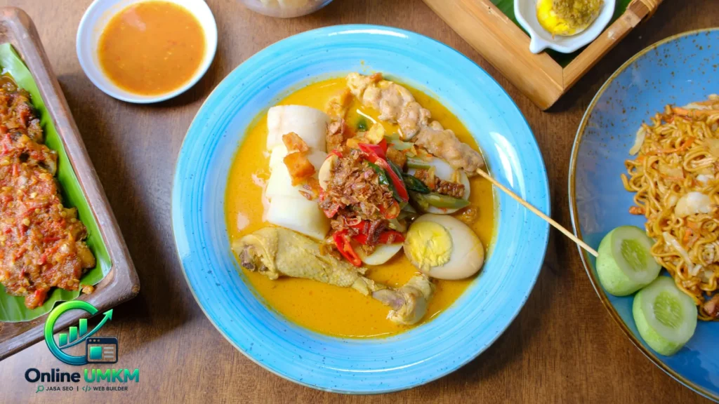 Sajian lengkap lontong cap go meh dengan kuah santan kuning, ayam, telur, sate, dan sambal goreng di atas meja kayu.